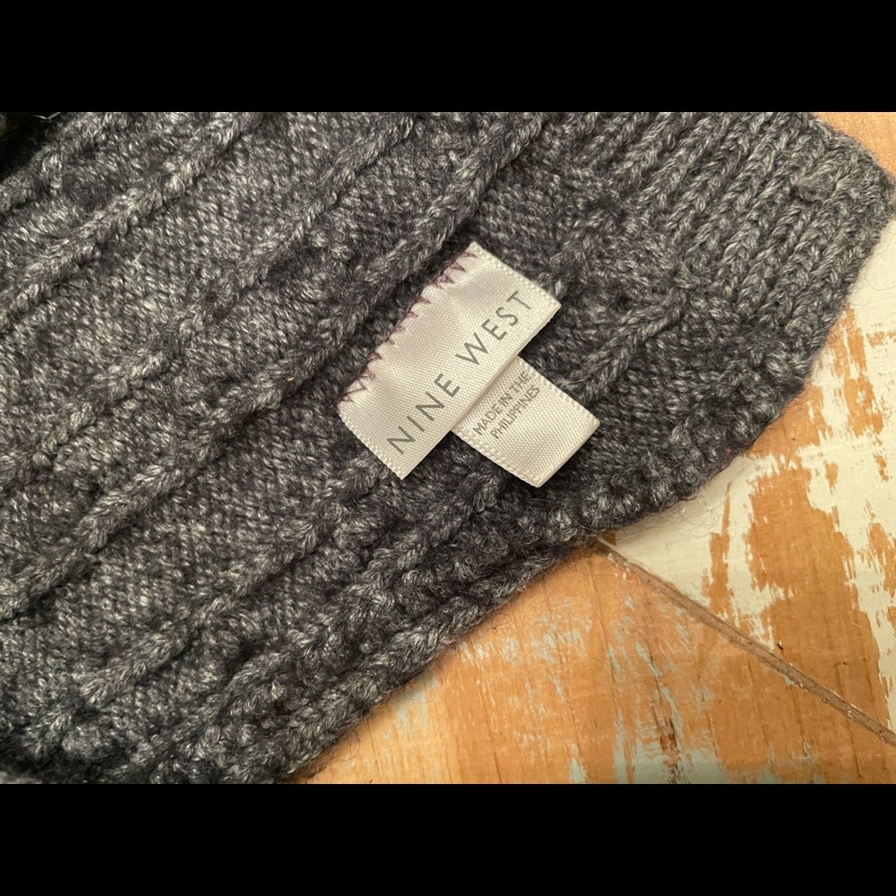 All the charcoal grays winter scarf, not so long that it is in the way!